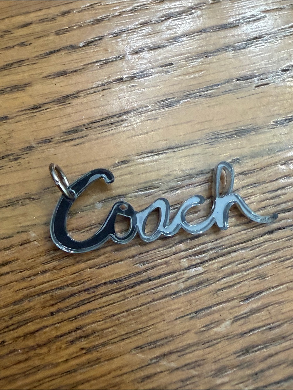 Coach Script Poppy Logo Hang Tag Charm in Silver